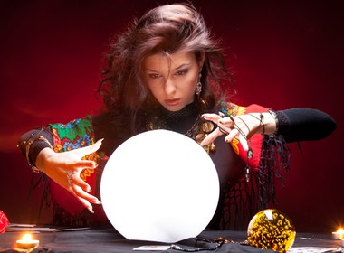 fortune teller looking into her crystal ball