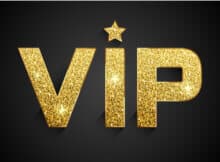 VIP in gold shiny letters on a black background with a gold crown above the word VIP