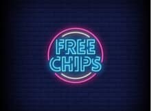 the words free chips in a kind of neon light font with light blue letters and a purple and blue background