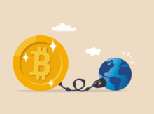 a golden bitcoin charging the entire earth through a USB