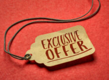 light beige tag like a price tag with the words exclusive offer in cordovan against an orange background