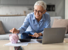 senior woman at home managing her money responsibly