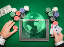 on a green background, a world globe, casino chips, a pair of aces, indicating the wide reach of online casinos