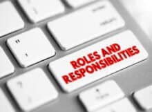 part of a computer keyboard with one key reading roles and responsibilities
